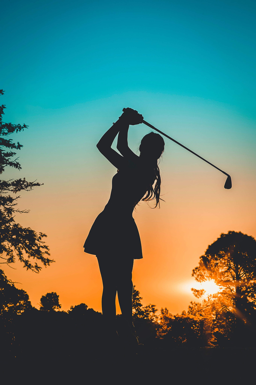 Silhouette Photo of a Woman Playing Golf